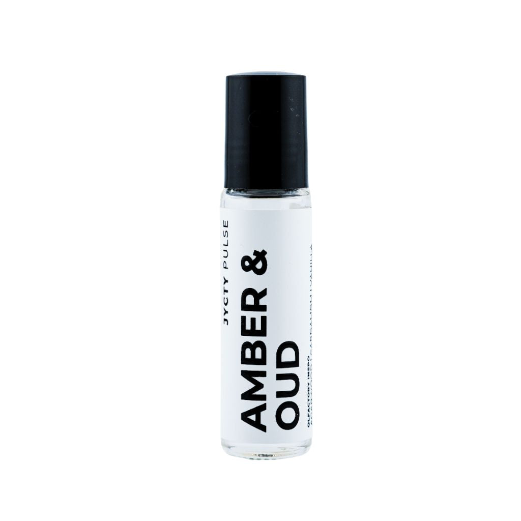 Roll-on bottle labeled 'Amber & Oud' on a white background