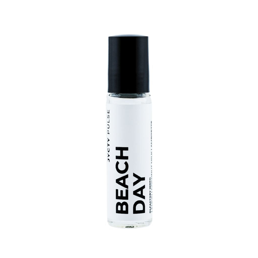 Roll-on bottle labeled 'Beach Day' on a white background