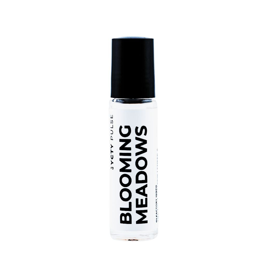 Roll-on bottle labeled 'Blooming Meadows' on a white background