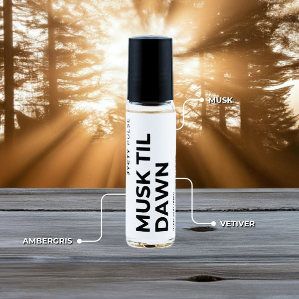 Roll-on bottle labeled 'Musk Til Dawn' with a forest background