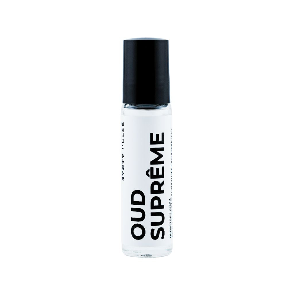 White bottle with black cap labeled 'Oud Supreme' on a white background