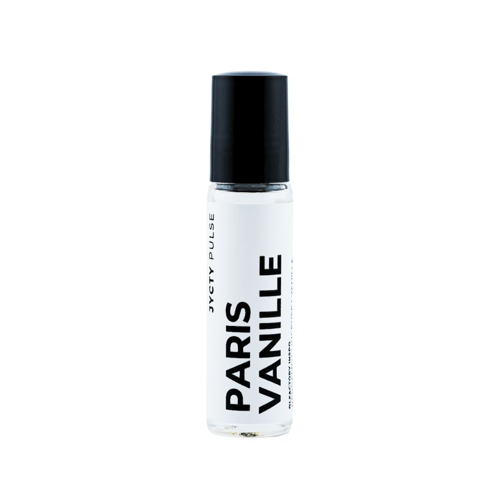 Roll-on bottle of 'Paris Vanille' perfume with black cap on a white background