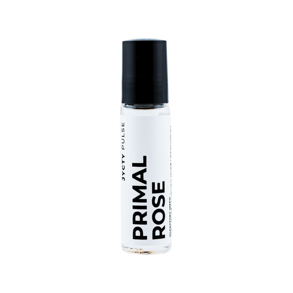 Roll-on bottle labeled 'Primal Rose' on a white background