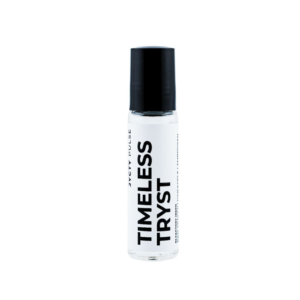 Small bottle with black cap and 'Timeless Tryst' text on a white background